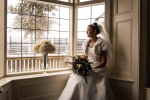 Bride sat looking out the window
