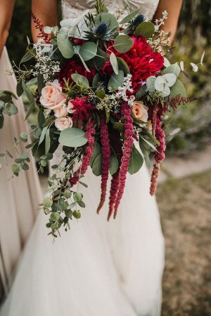 bridesmaid holding a bunch of flowers