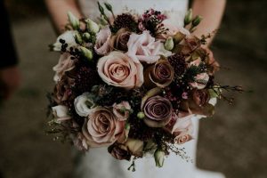bunch of flowers held by bridesmaid
