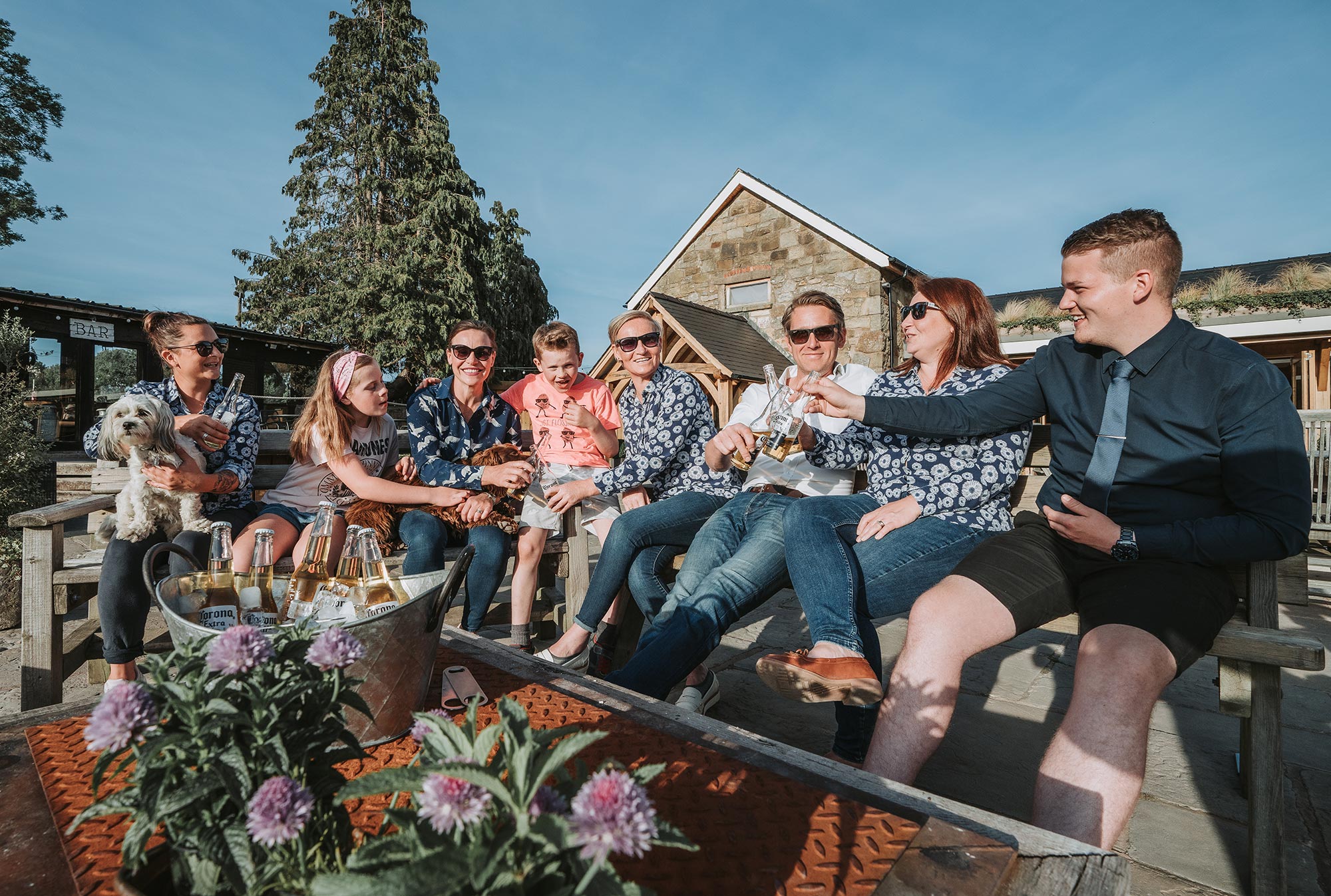 the Tower Hill barns wedding management team, owners Sally and Andrew with children and dog, managers Sophie and Jo, and key operational team Dominique and Jordan with dog